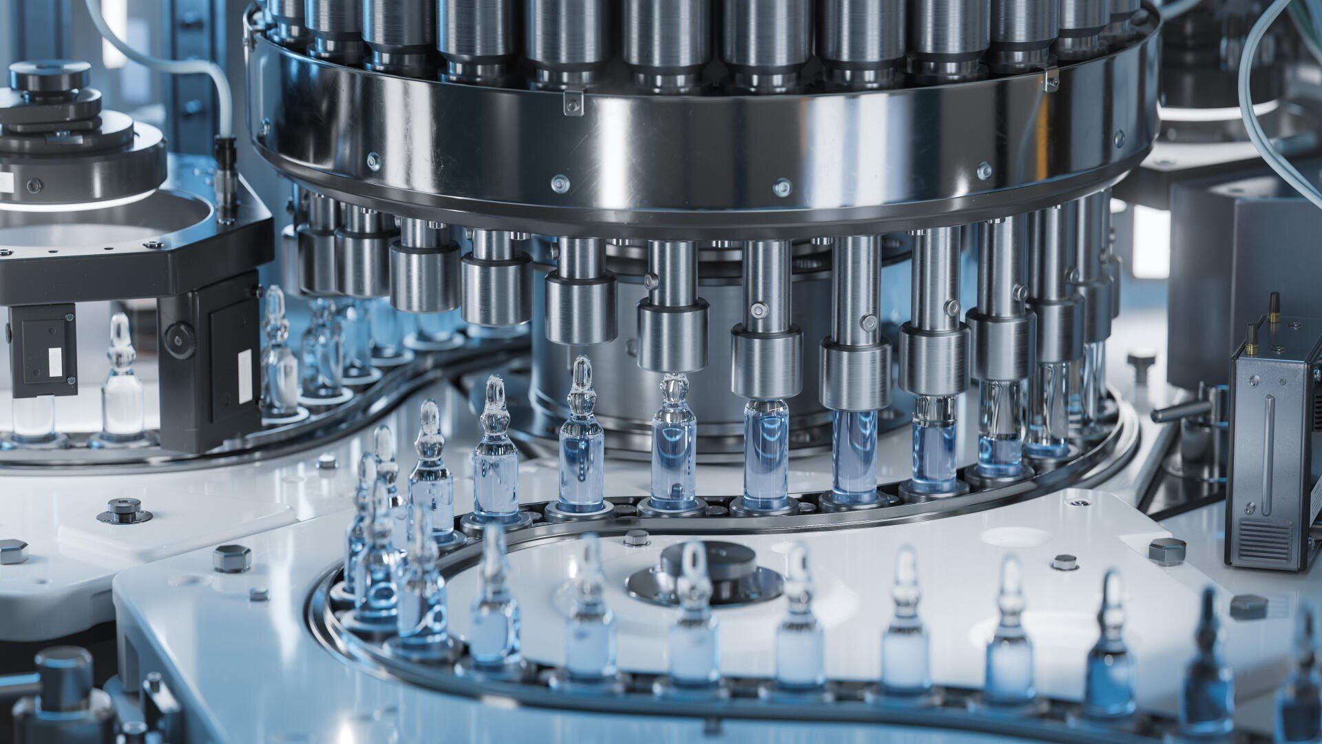 Automated machines fill glass vials with liquid in a sterile, high-tech pharmaceutical production facility, with rows of vials on a conveyor system beneath metal equipment.