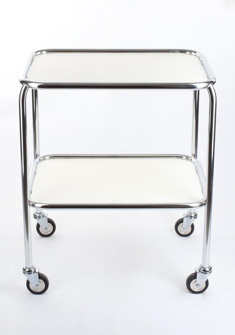 A two-tiered metal utility cart with chrome frame and white shelves, standing on four swivel caster wheels against a plain white background.