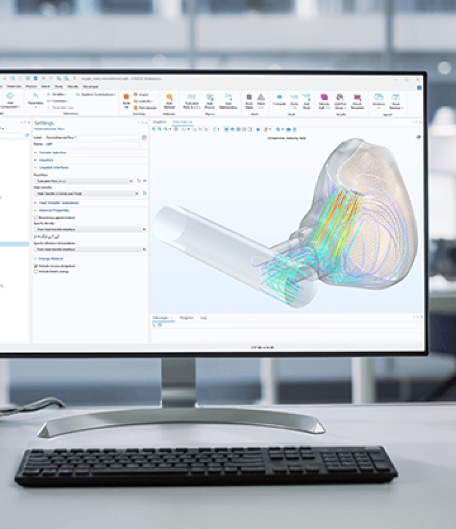 A 3D flow simulation of the airflow through a nasal cavity is displayed on a computer monitor, with colored streamlines and settings visible in the simulation software. A keyboard is located on the desk below the monitor.