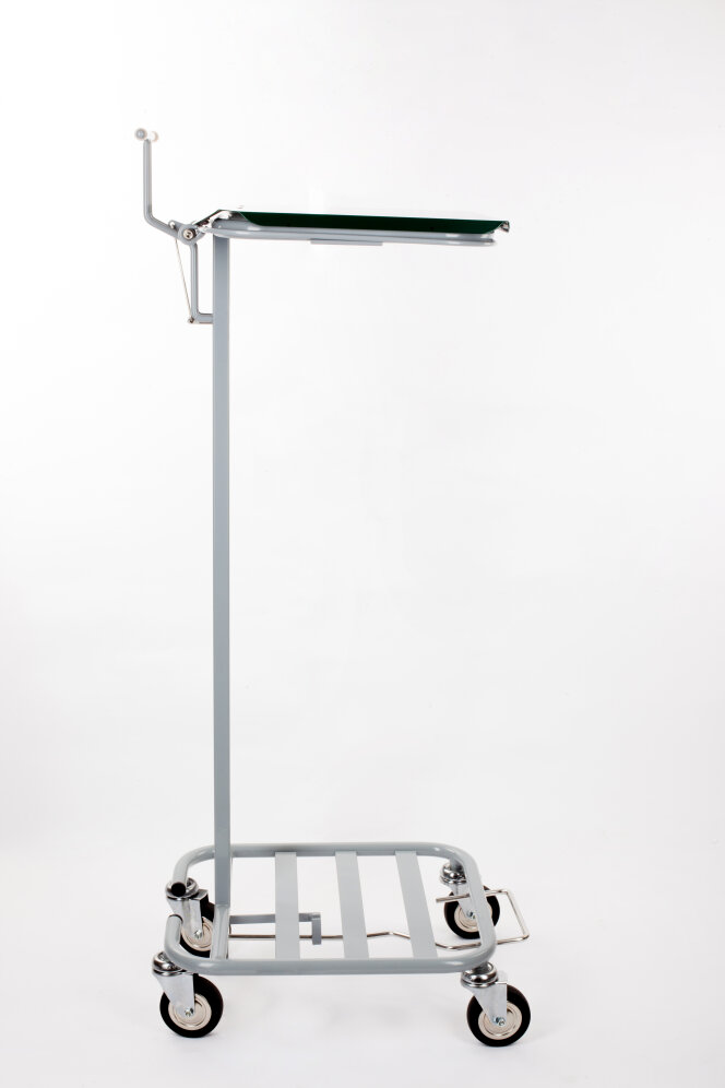 A metal medical instrument stand with a flat rectangular tray, adjustable arm, and four caster wheels, positioned against a plain white background.
