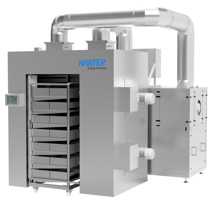 Eine große industrielle Trocknungsmaschine mit mehreren Fächern und einer digitalen Anzeige. Das Gerät hat Metallrohre und Entlüftungsöffnungen und ist mit Harter drying solutions gekennzeichnet. Das Gerät ist für die Trocknung oder Verarbeitung von Materialien konzipiert.